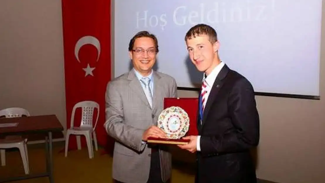 FÜ'den Sempozyuma Katılım