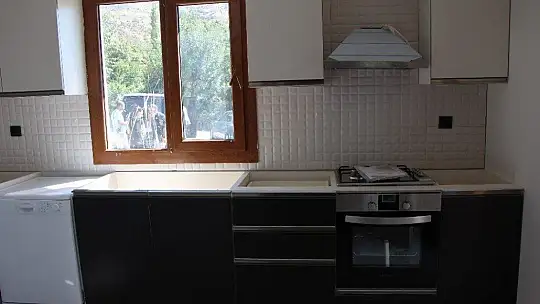 Bakan Kurum, şantiyeye dönen Elazığ'da deprem konutlarını inceledi