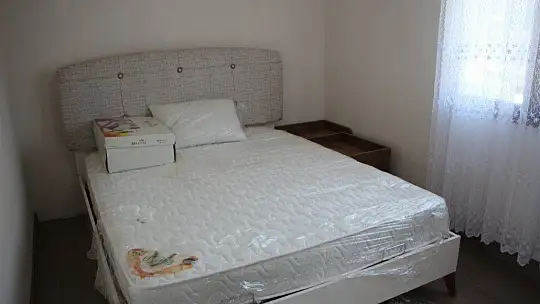 Bakan Kurum, şantiyeye dönen Elazığ'da deprem konutlarını inceledi