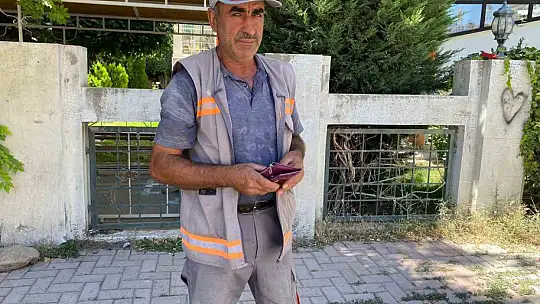 Temizlik personeli para dolu cüzdanı polise teslim etti