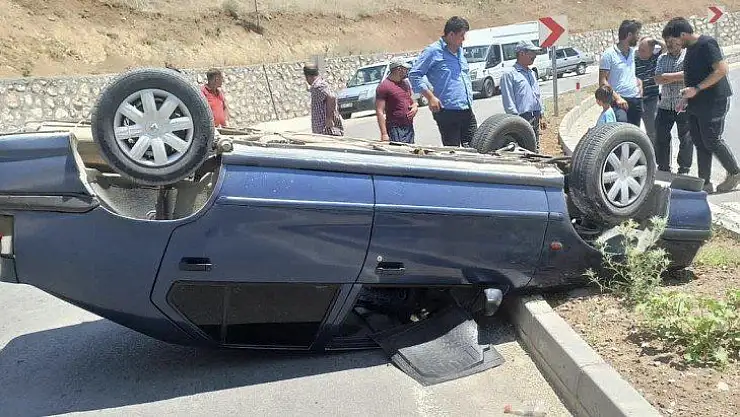 Ters dönen otomobilden burnu kanamadan çıktı